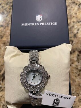Montres Prestige Women's Silver Crystal Floral Bracelet Watch